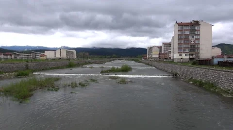 Small river flowing through the city Stock Footage 45311305