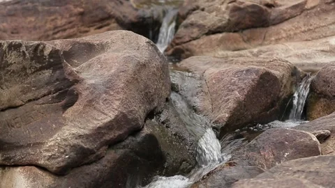Small river flowing through a rocky landscape, Natividade, Tocantins Stock Footage 317790184