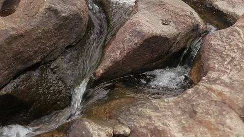 Small river flowing through a rocky landscape, Natividade, Tocantins Stock Footage 317790204