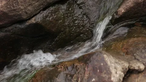 Small river flowing through a rocky landscape, Natividade, Tocantins Stock Footage 317790209