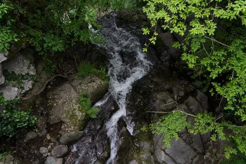A small river in the forest between the rocks, Georgia Stock Photos