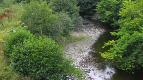 Small River at Highlands Region at Rain, Scotland Stock Footage 42934281