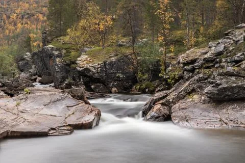 Small river long exposure autumn in Finnmark Fotos Stock