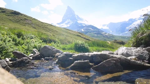 Small River in Mountains - Slow Motion - 2 Clips Stock Footage 93344597