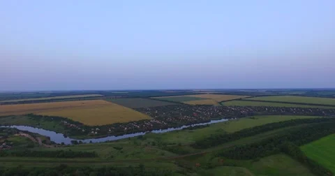 Small river in the prairie and the moon above the horizon Video stock 64414108