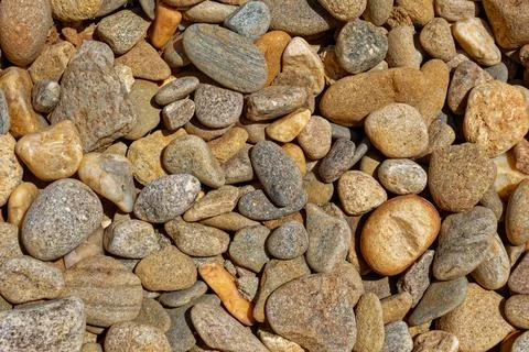 Small river rocks closeup Stock Photos