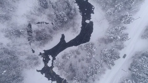 Small river in a snowy forest Stock-Footage 105072380