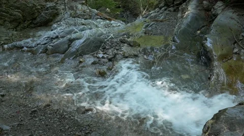 Small river streaming in rocky river bed Stock Footage 56165430