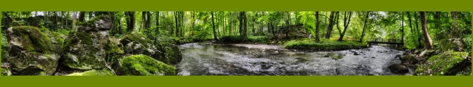 Small River through Forest Stock Photos