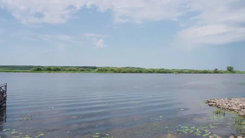 A small river, view from the shore, slow motion camera Stock-Footage 329093139