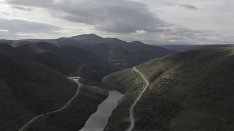 A small river within two mountains Stock Footage 237343131