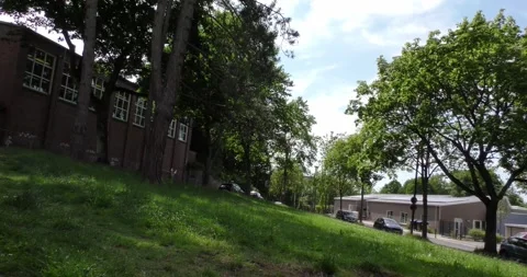 A small road leads off a slightly larger one Stock Footage 273133119