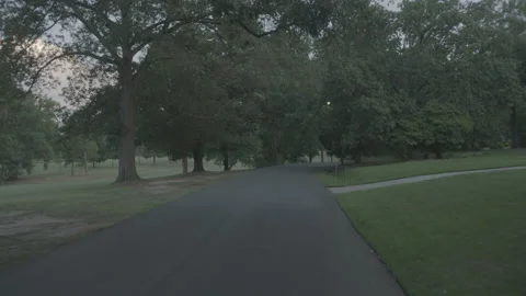Small road next to a gold course Stock-Footage 149146693