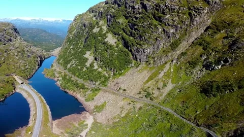 Small road through the mountains Stock Footage 239551812