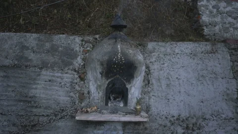Small Roadside Prayer Site in the Rock – Darjeeling, India 動画素材 244285158