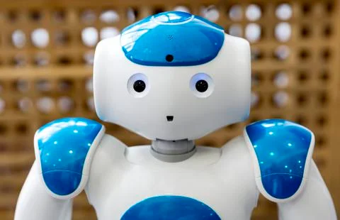 Small robot with human face and body. AI Stock Photos
