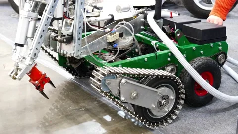 Small robot manipulator on crawlers Stock Footage 147869462