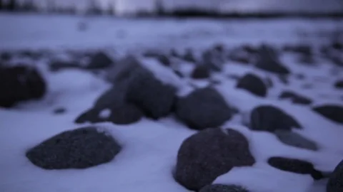 Small rocks covered with snow during winter Stock Footage 83866931