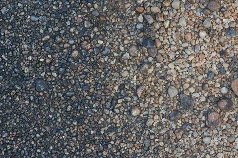 Small rocks ground surface, full frame background Stock Photos