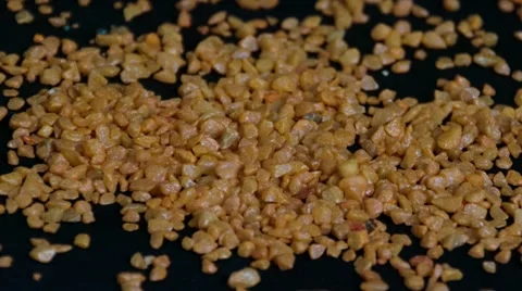 Small Rocks Sand on Black Background Stock Footage 68033357