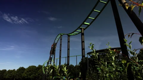 Small roller coaster in slow-motion bright colors Video stock 302001729