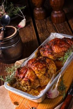 Small Rolling roasts fully with dried fruit and bacon Stock Photos