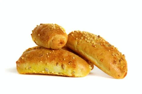 Small rolls of corn bread on a white background. Stock Photos