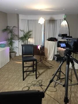 A small room setup for an interview style video shoot behind the scenes Stock Photos