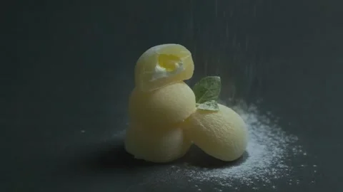 Small round buns stuffed with sweet filling and decorated leaves. Flour or Stock Footage 178489994