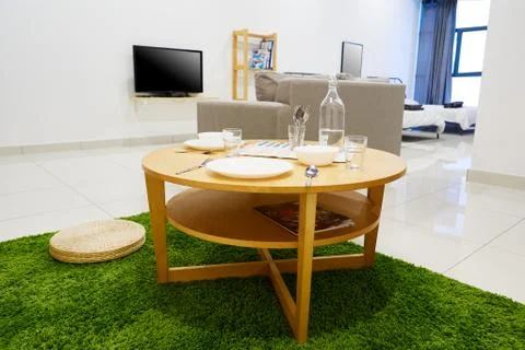 A small round coffee table Stock Photos