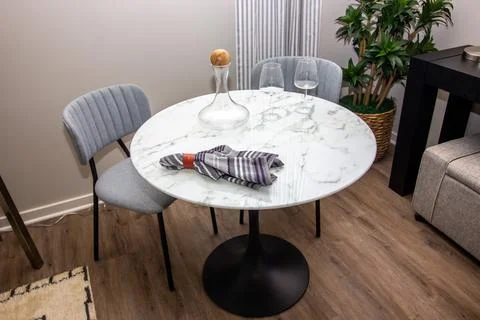 Small Round Granite Table With Two Chairs Stock Photos