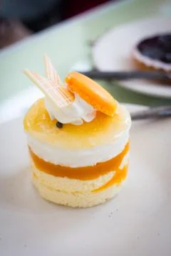 Small round orange cake Stock Photos