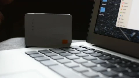 A small router is connecting to the net Stock-Footage 106282177