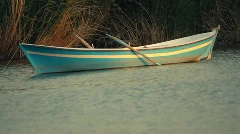 Small Rowing Boat on the lake Stock Footage 11251979