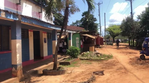 Small Rural Posta Post Office on Dusty Street Ukunda Kenya East Africa Stock Footage 252980345
