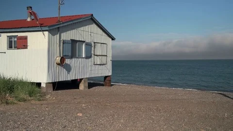 Small Rustic Oceanside House by the Sea. Stock Footage 82129582