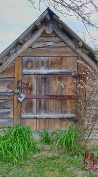 Small rustic wooden cellar Stock Photos