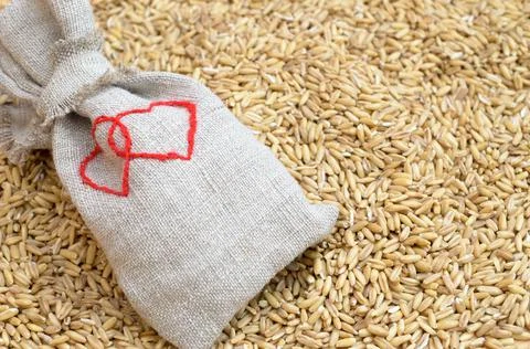 Small sacks of sacking with the image of two hearts Stock Photos