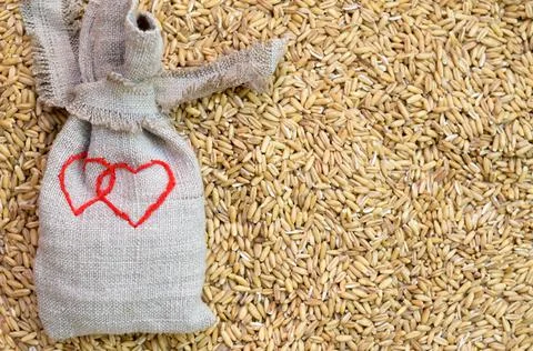 Small sacks of sacking with the image of two hearts Stock Photos