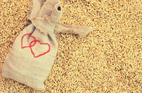 Small sacks of sacking with the image of two hearts Stock Photos