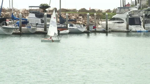 Small Sailboat in harbor Stock Footage 40723143