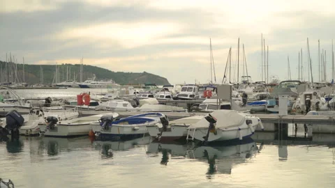 Small sailboats and boats moored in  port. Stock Footage 155031053