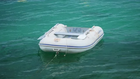 A small sailing boat swinging on the waves. Croatia, Adriatic sea. Slow motion Stockbeeldmateriaal 134654932