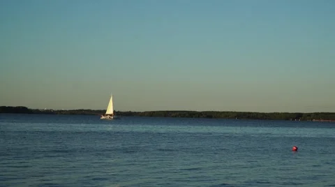 A small sailing boat on the water Stock Footage 68319967
