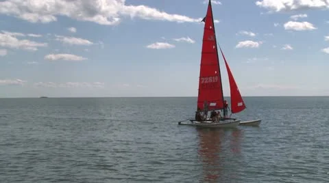 Small sailing craft coming in Stock Footage 10785853