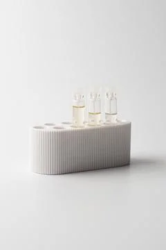 A small sample bottle of parfume Foto stock