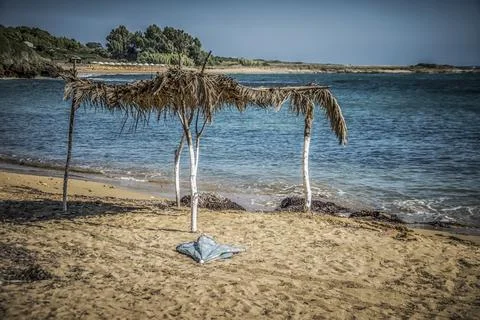 Small sandy beach in Greece Stock Photos