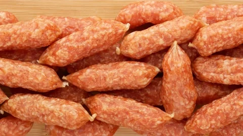 Small sausages on the kitchen board. Stock Footage 144685272