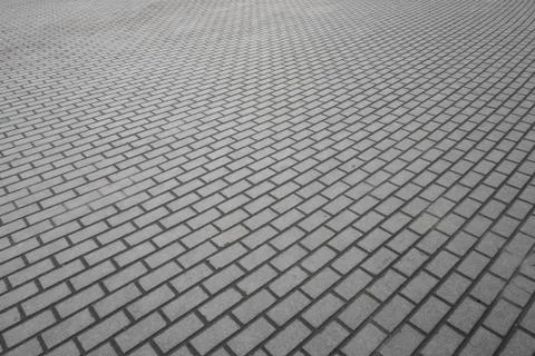 Small-scale background texture of modern gray cobblestone pavement 스톡 사진