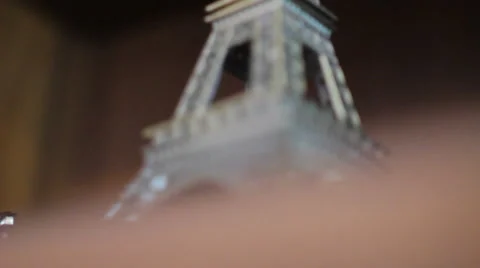 A small-scale copy of the Eiffel Tower with rings Stock Footage 63508966
